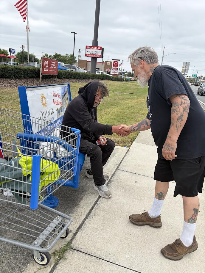 Volunteer connecting with a community member